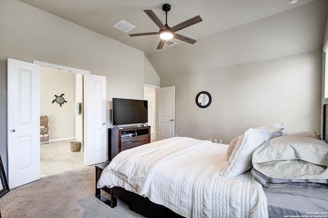 bedroom with a ceiling fan, visible vents, vaulted ceiling, and carpet flooring