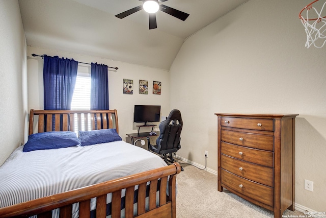 carpeted bedroom featuring lofted ceiling, baseboards, and a ceiling fan