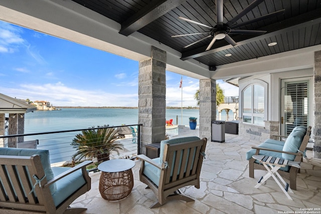 404 Matern Ct, Horseshoe Bay, TX 78657 - view of patio with a water view, a balcony, and a ceiling fan