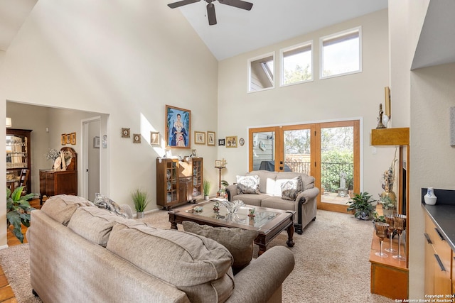 living area featuring high vaulted ceiling, carpet, and ceiling fan