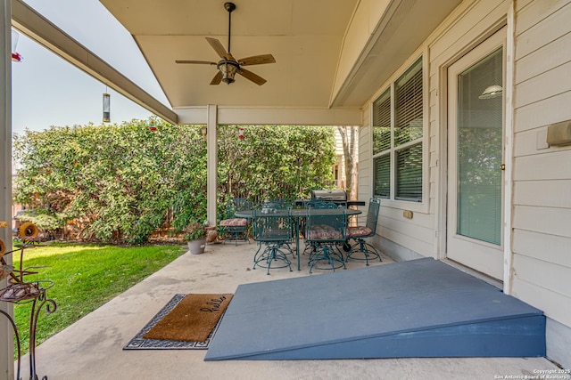 view of patio / terrace featuring a ceiling fan and outdoor dining space