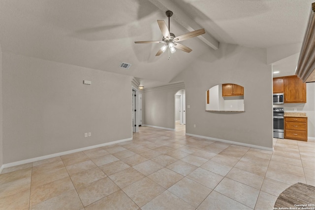 unfurnished living room with visible vents, ceiling fan, lofted ceiling with beams, light tile patterned floors, and arched walkways