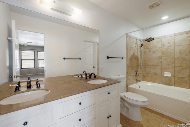 full bath featuring shower / washtub combination, visible vents, a sink, and toilet