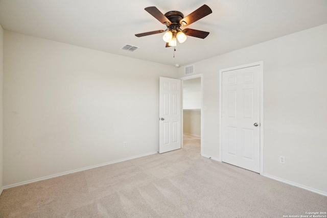7207 Anacua Crk, San Antonio, TX 78253 - unfurnished bedroom with light carpet, baseboards, and a ceiling fan