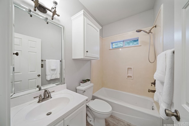 bathroom with vanity, shower / tub combination, and toilet