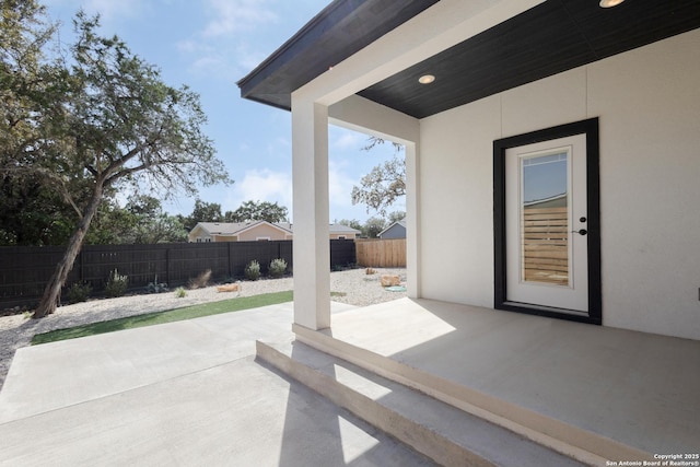 view of patio with fence