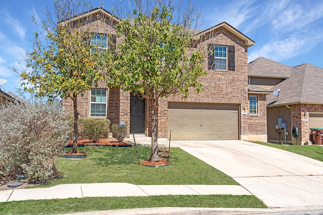 view of front of home with a garage, a front yard, concrete driveway, and brick siding