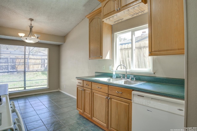 kitchen with a textured ceiling, white dishwasher, a sink, baseboards, and pendant lighting