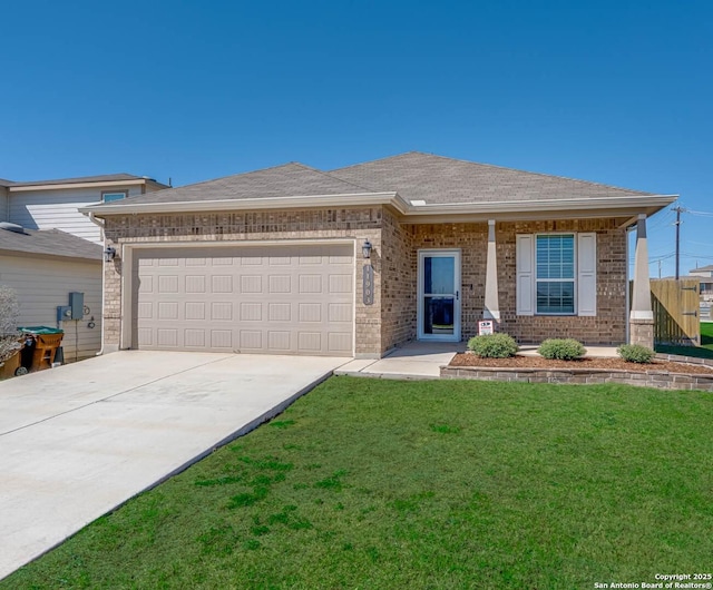 view of front of house featuring brick siding, a shingled roof, an attached garage, a front yard, and driveway