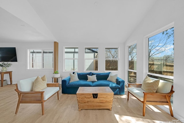 sunroom with lofted ceiling