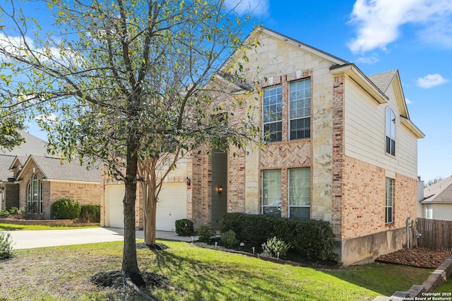 traditional-style home featuring brick siding, fence, a garage, driveway, and a front lawn