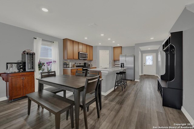 417 Briarfield, Seguin, TX 78155 - dining space with recessed lighting, wood finished floors, and baseboards