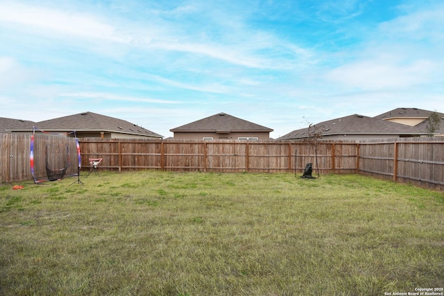 view of yard featuring fence