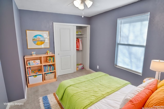 bedroom with ceiling fan, baseboards, and a closet