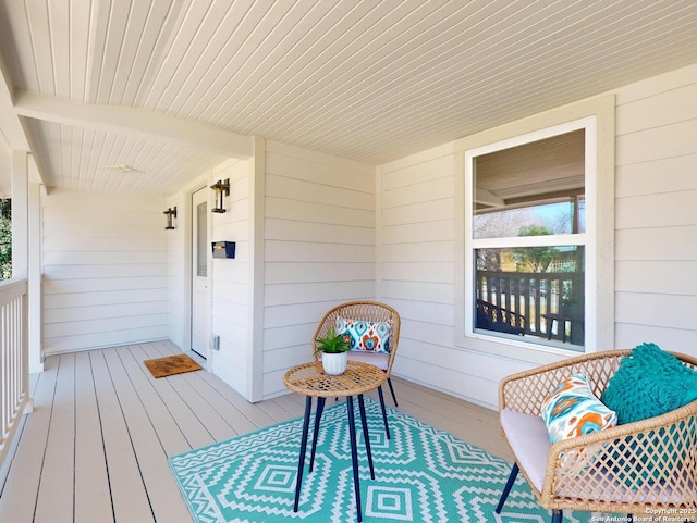 deck featuring covered porch