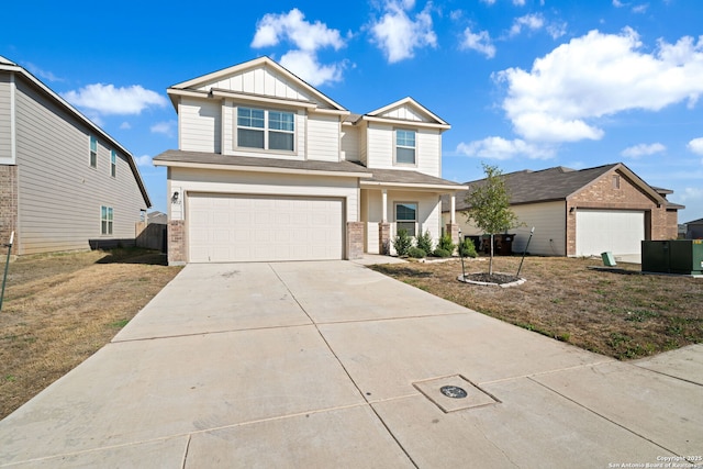 craftsman-style house featuring an attached garage, brick siding, board and batten siding, and concrete driveway