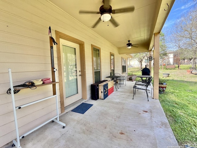 view of patio featuring a ceiling fan