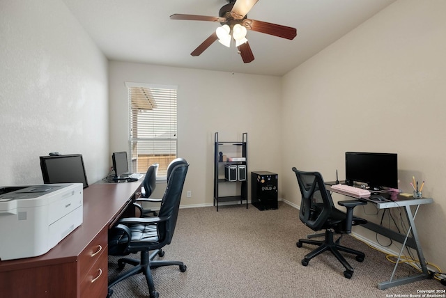 office area featuring ceiling fan, carpet floors, and baseboards