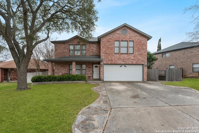 traditional-style home featuring an attached garage, brick siding, a front yard, and fence