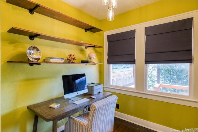 office featuring dark wood-type flooring and baseboards