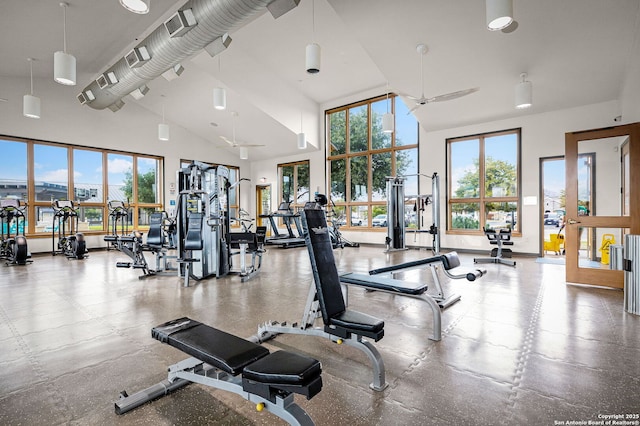 workout area with high vaulted ceiling and a ceiling fan