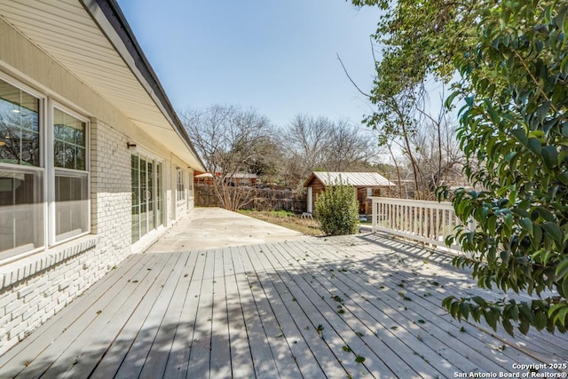 deck with an outbuilding