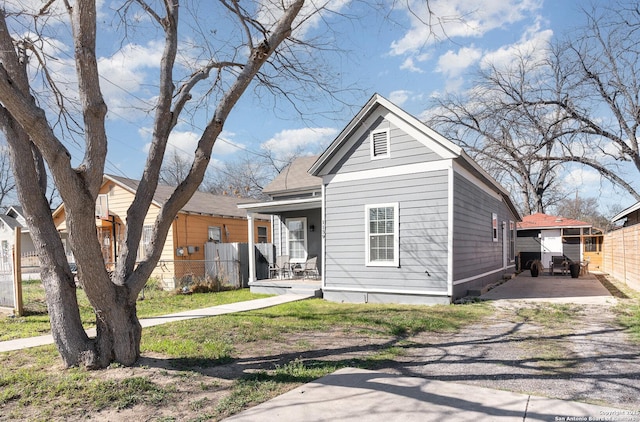 view of front of property featuring fence