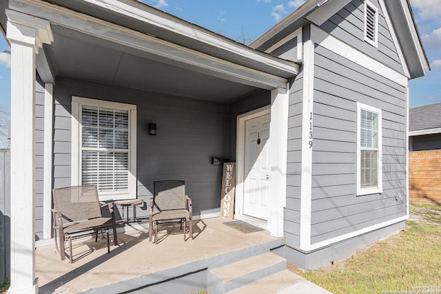 property entrance with a porch