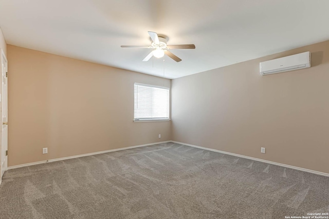 carpeted empty room featuring a wall mounted AC, a ceiling fan, and baseboards