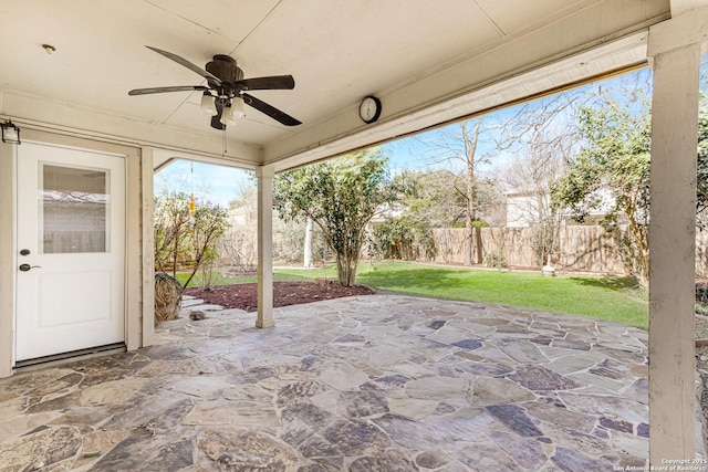 view of patio featuring a fenced backyard and ceiling fan