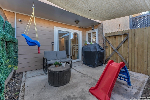 view of patio / terrace with fence and grilling area