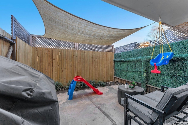 view of patio featuring a fenced backyard