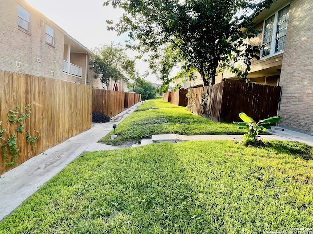 view of yard with fence