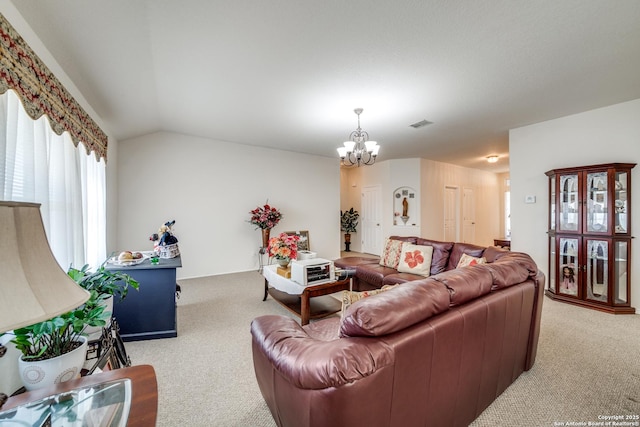 living room featuring carpet flooring, vaulted ceiling, and an inviting chandelier