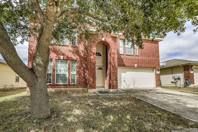 traditional-style home with brick siding, driveway, and an attached garage