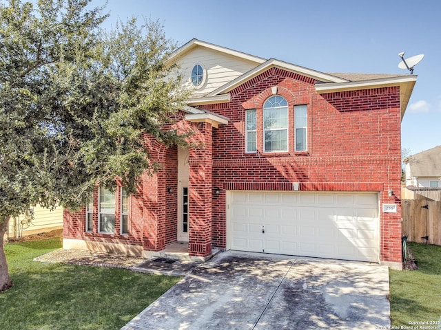 traditional-style home with a garage, brick siding, fence, driveway, and a front yard