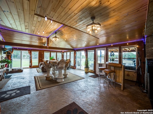 living room with lofted ceiling and wood ceiling