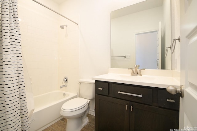 bathroom featuring vanity, toilet, and shower / tub combo with curtain