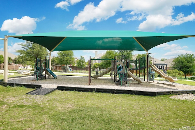 communal playground with a lawn