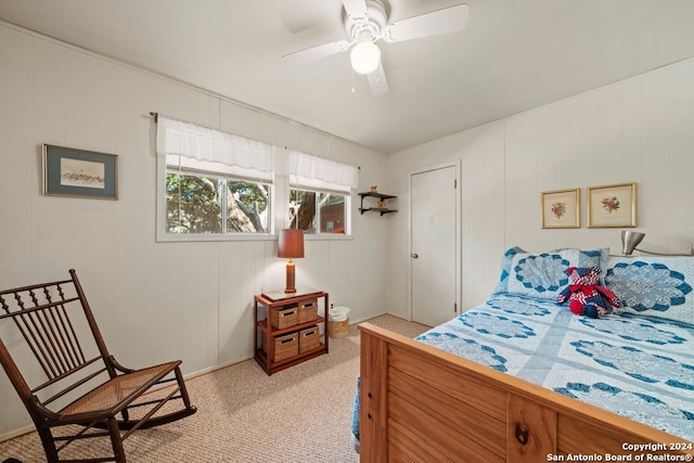 bedroom featuring light colored carpet and ceiling fan