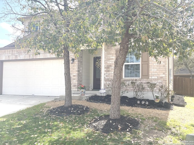 obstructed view of property featuring an attached garage, fence, concrete driveway, and brick siding