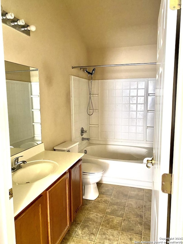 full bathroom with washtub / shower combination, toilet, and vanity