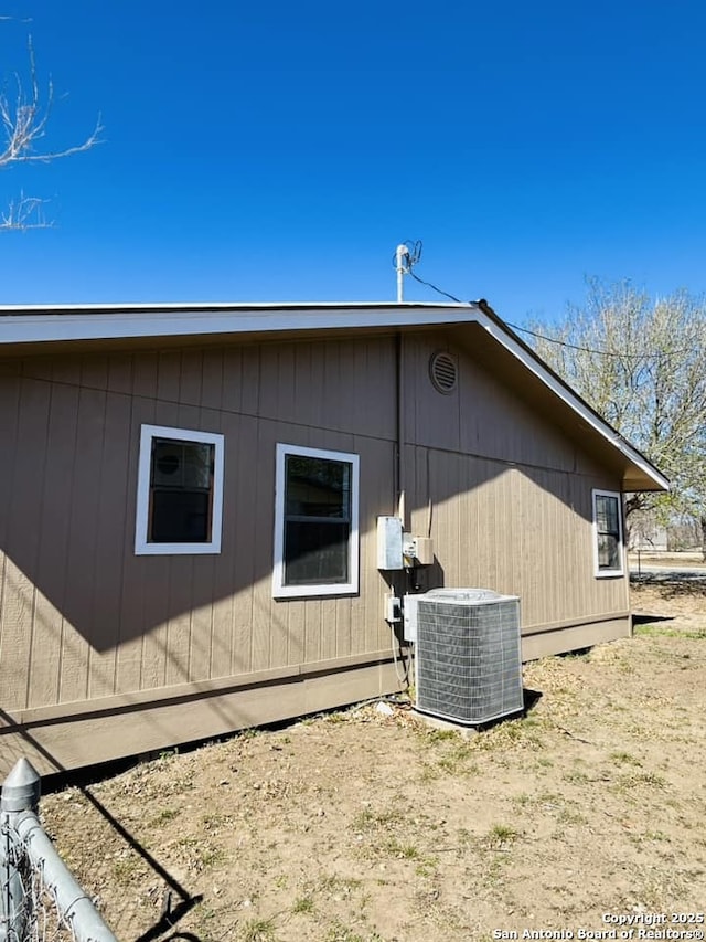 view of home's exterior with cooling unit