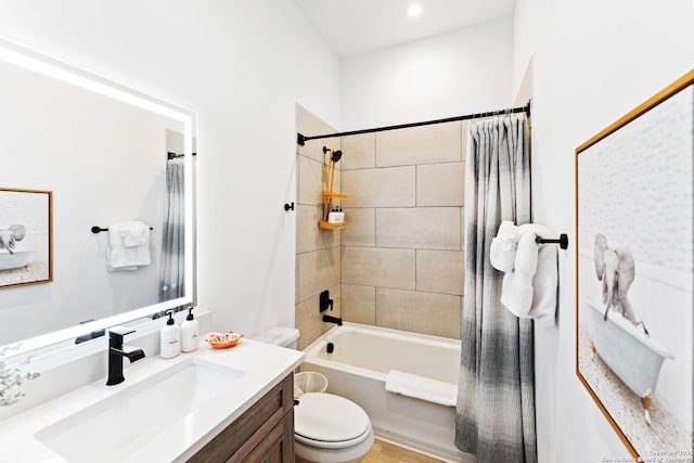 full bathroom with vanity, toilet, and shower / bath combo with shower curtain