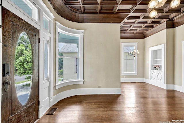 317 Wickes, San Antonio, TX 78210 - entrance foyer featuring crown molding, coffered ceiling, a chandelier, and hardwood / wood-style floors