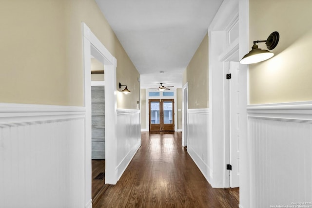 317 Wickes, San Antonio, TX 78210 - corridor featuring wainscoting, french doors, wood finished floors, and a decorative wall