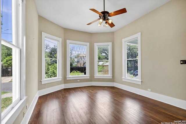 317 Wickes, San Antonio, TX 78210 - spare room with dark wood-type flooring and ceiling fan