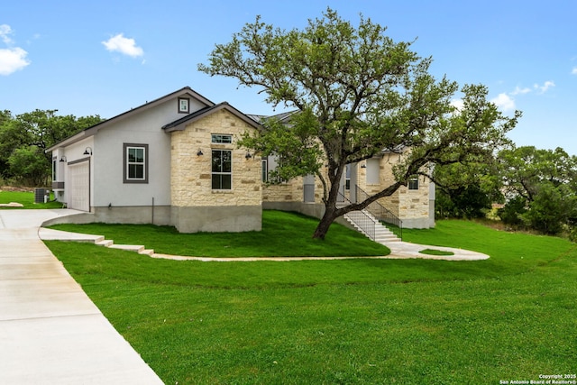 view of side of home with a garage, stone siding, a lawn, and concrete driveway