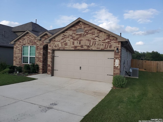 view of front of house featuring a garage, concrete driveway, brick siding, and cooling unit