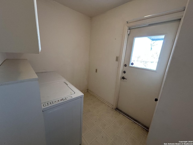 laundry room with laundry area, separate washer and dryer, and light floors